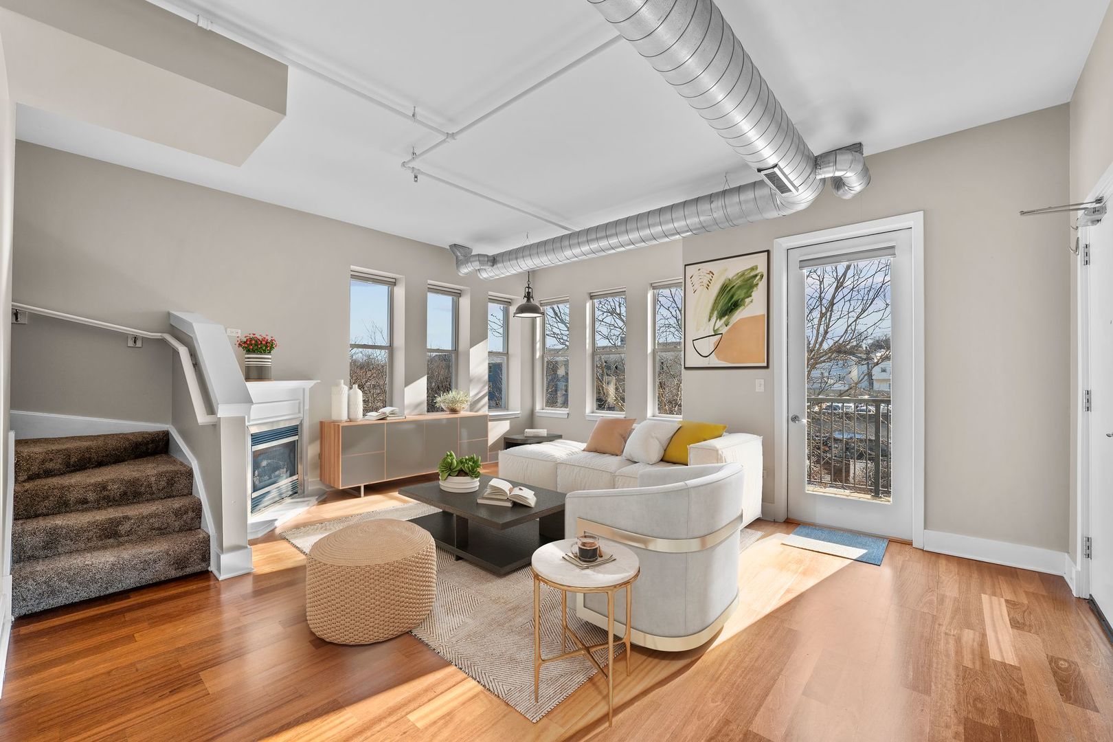 351 Front Street, Unit 2212 Lemont, IL 60439 - Photo 9 of 36 a living room with furniture and wooden floor