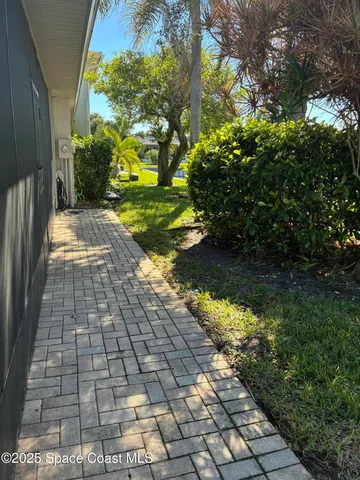 a view of a golf course with a lake