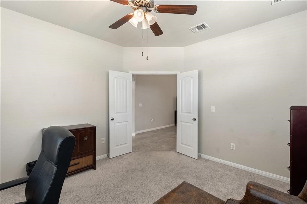 601 Flag Lane Leander, TX 78641 - Photo 7 of 38 a view of room with workspace and a window