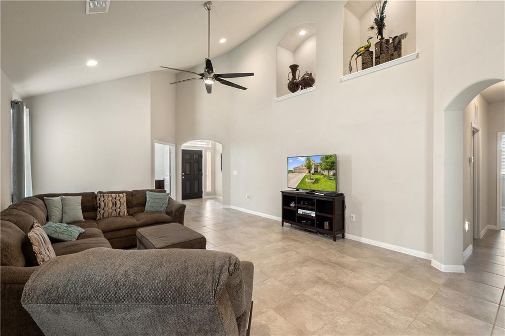 601 Flag Lane Leander, TX 78641 - Photo 10 of 38 a living room with furniture and a couch