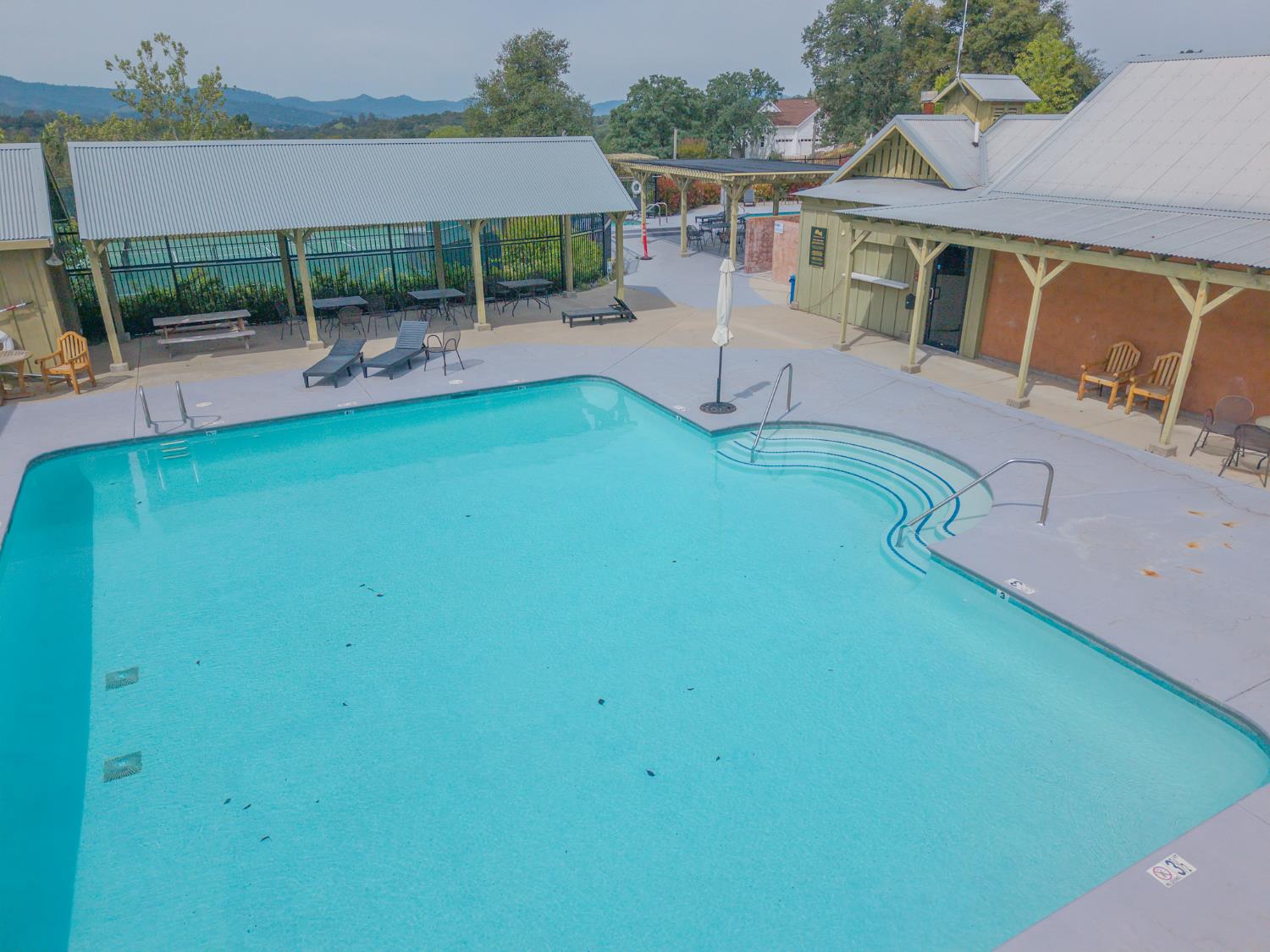 264 Blair Mine Road Angels Camp, CA 95222 - Photo 24 of 26 swimming pool view with a outdoor seating