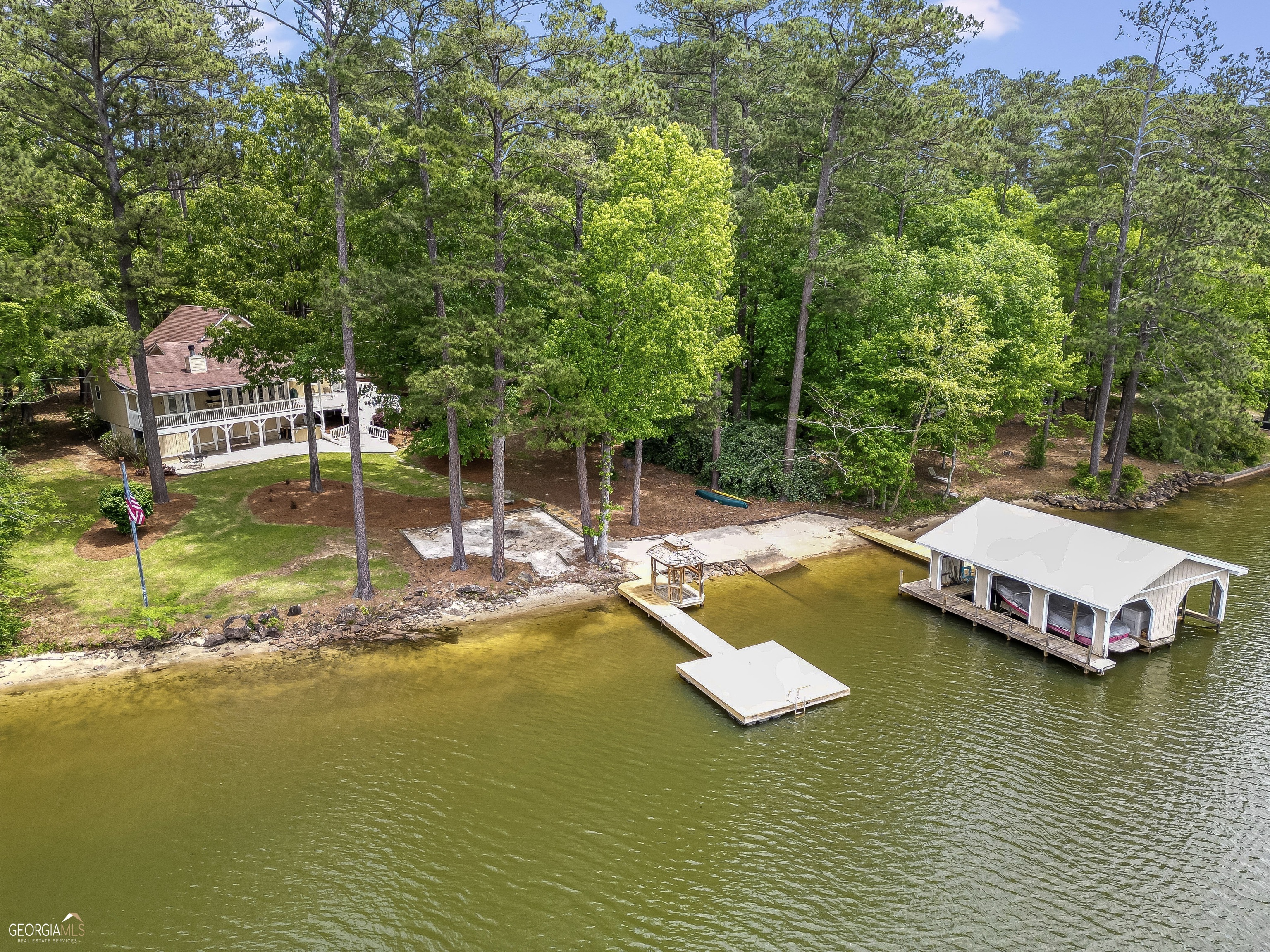 a view of a swimming pool with lounge chair