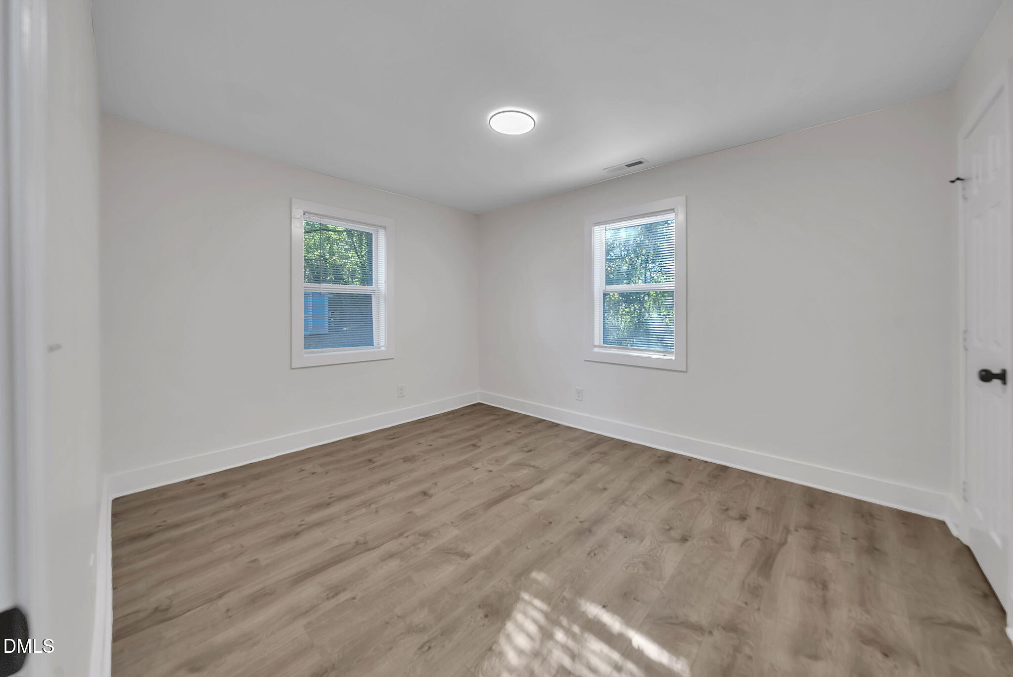 510 East Branch Street Spring Hope, NC 27882 - Photo 18 of 32 an empty room with a window
