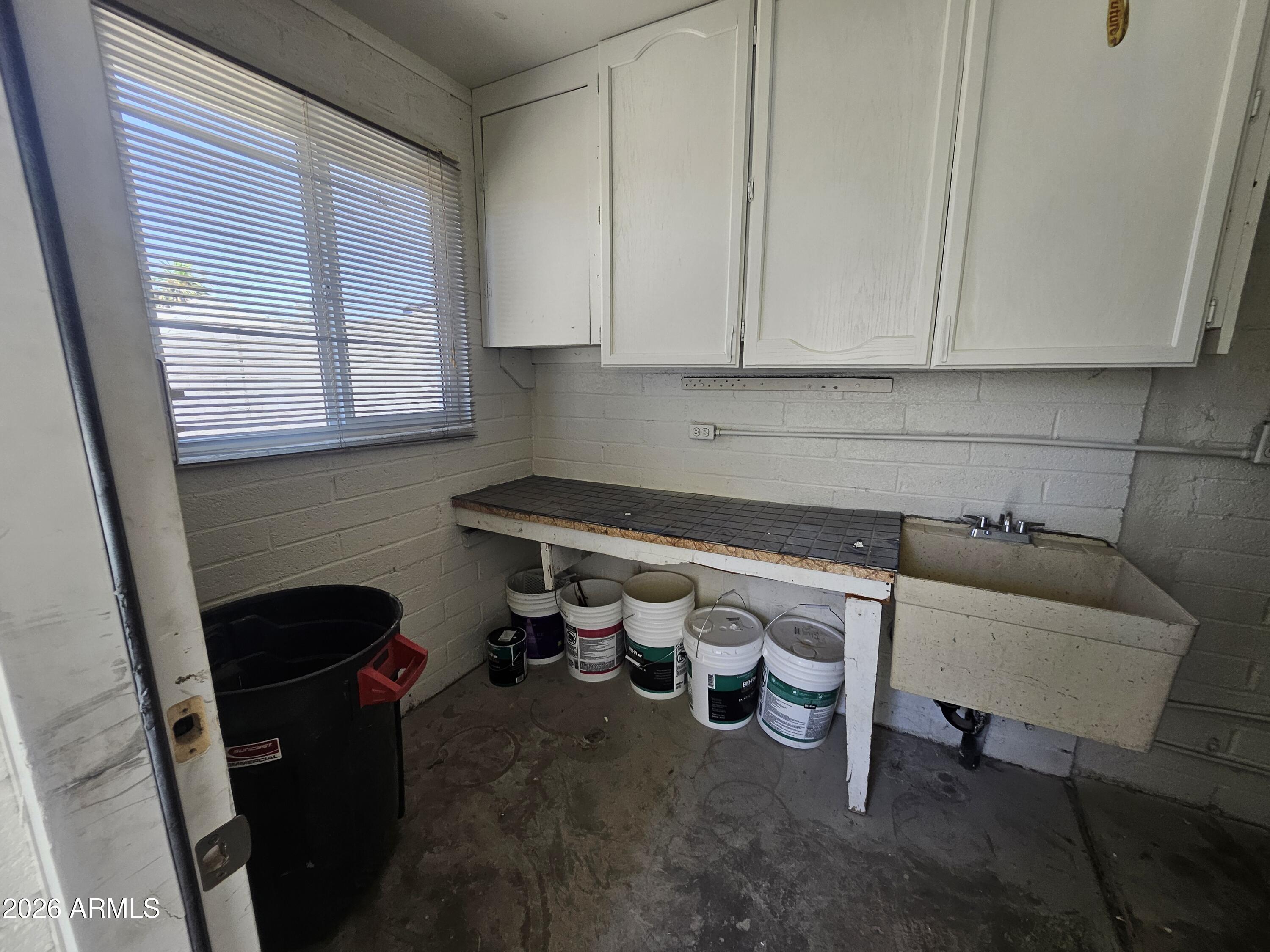 524 West 3rd Place Mesa, AZ 85201 - Photo 22 of 23 a room with storage and utility