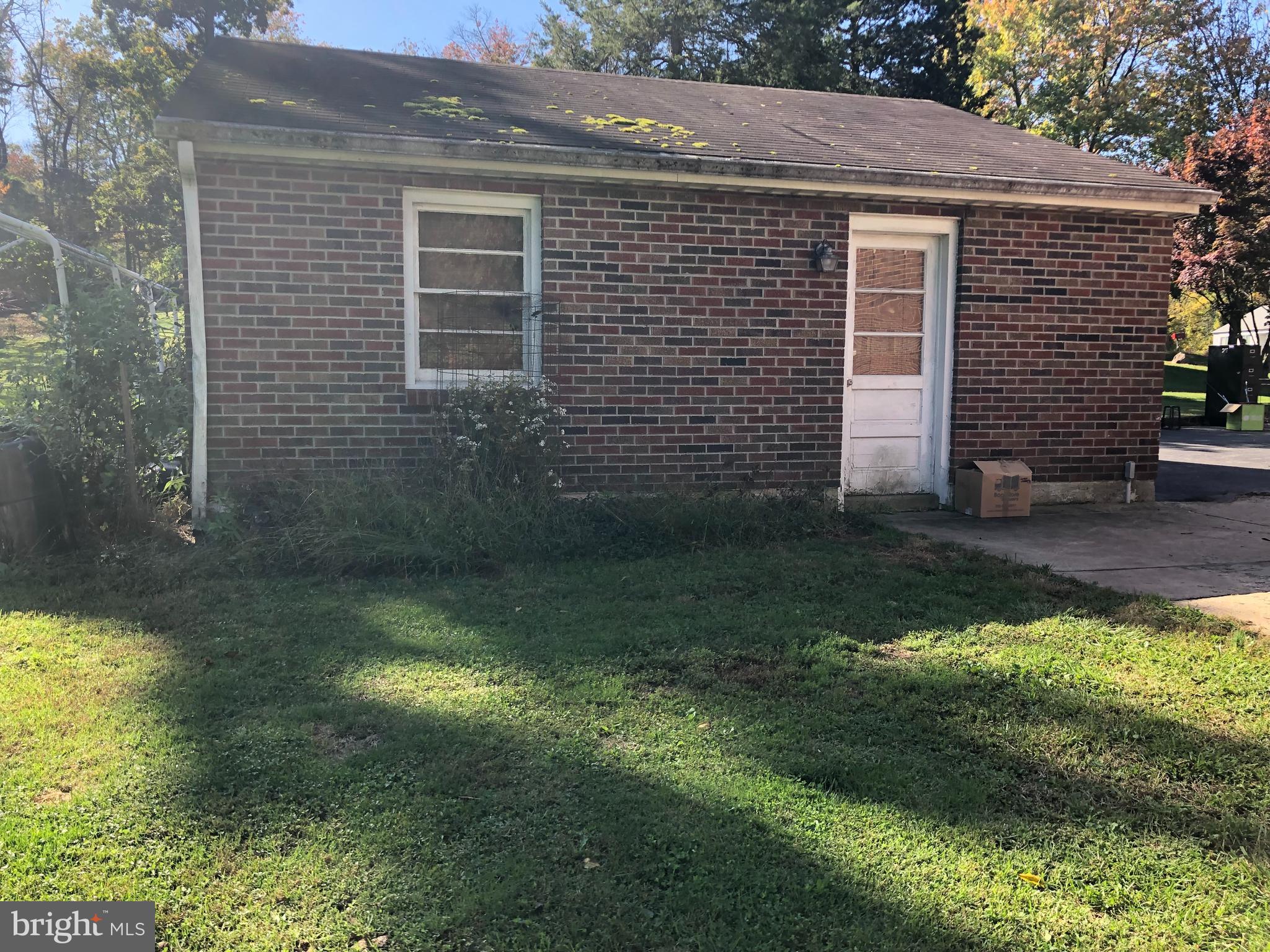 110 Midway Road Phoenixville, PA 19460 - Photo 42 of 44 2-Car Detached Garage Man Door Entrance
