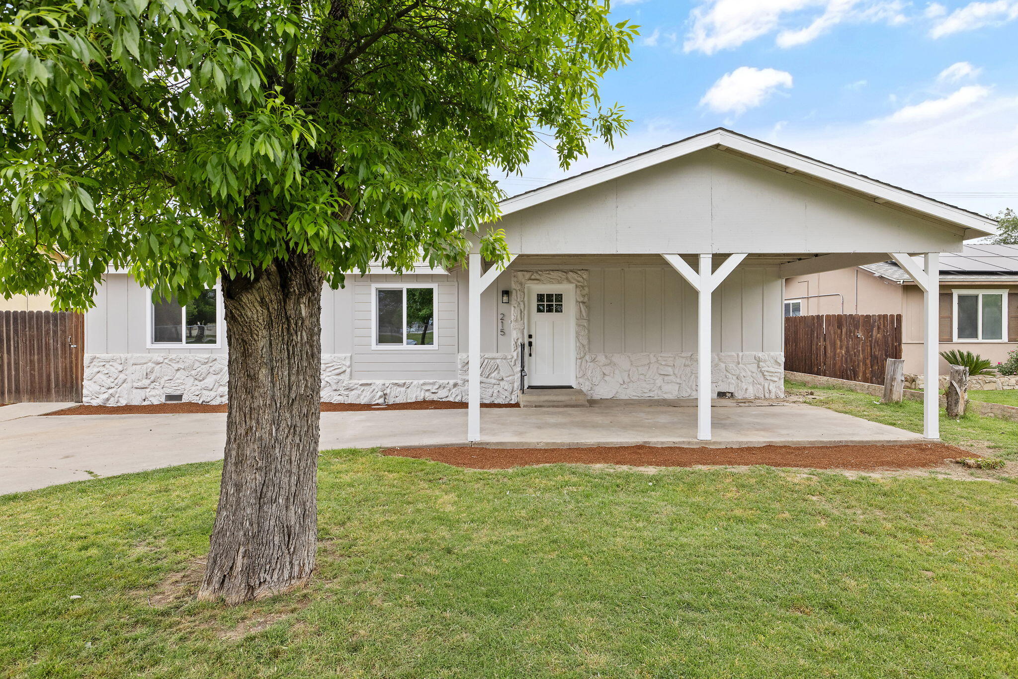 215 Lombardy Lane Lemoore, CA 93245 - Photo 1 of 30 2-web-or-mls-713A9557