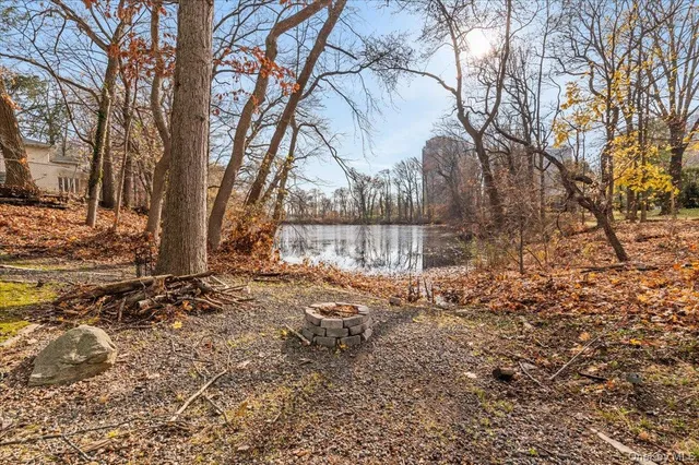 a view of a backyard of the house