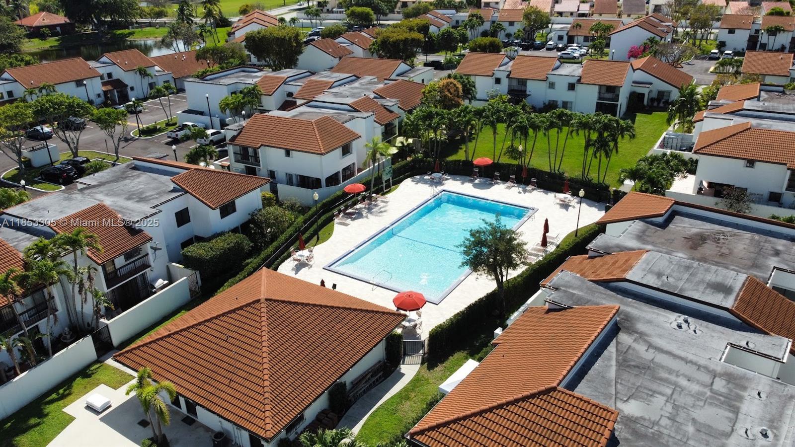 1331 Southwest 124th Court, Unit E3 Miami, FL 33184 - Photo 15 of 17 an aerial view of a house