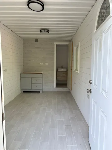 a view of a room with racks on the wall