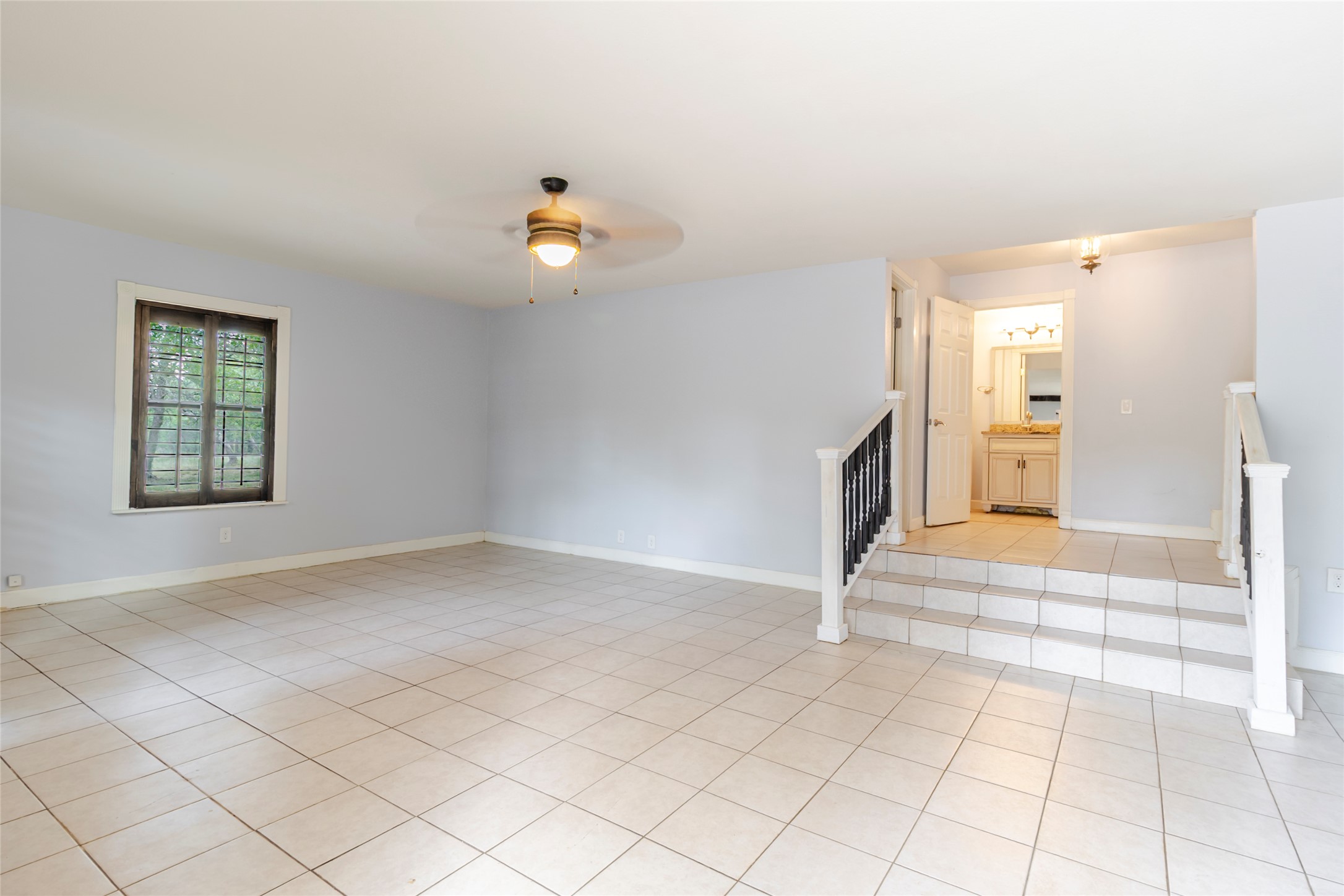 4459 Pettytown Road Dale, TX 78616 - Photo 12 of 30 an empty room with windows and fireplace