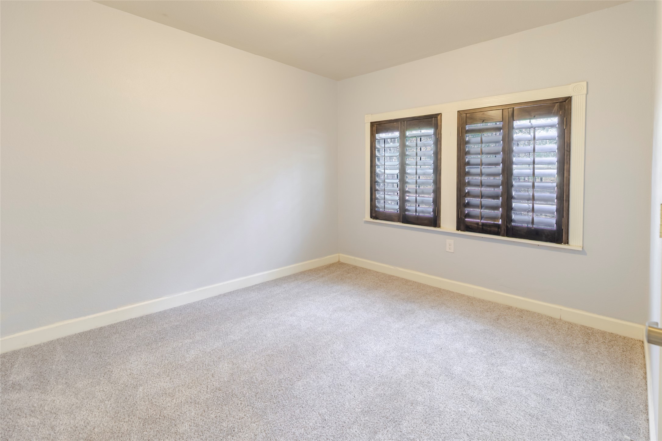 4459 Pettytown Road Dale, TX 78616 - Photo 15 of 30 an empty room with windows