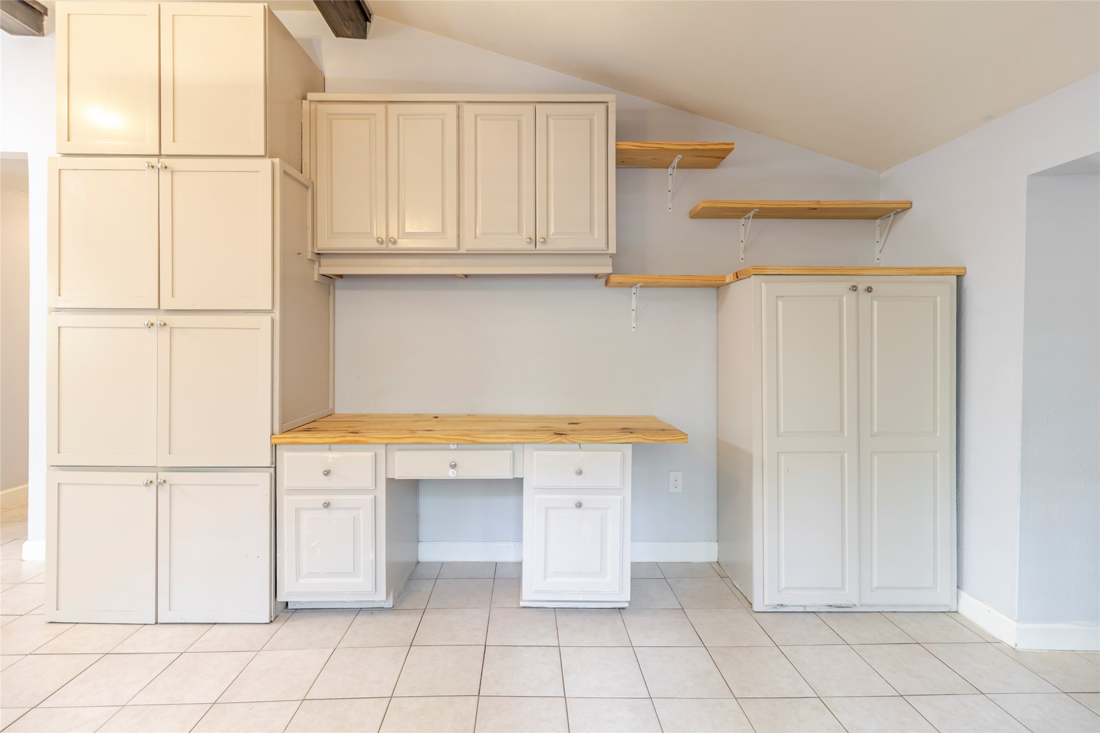 4459 Pettytown Road Dale, TX 78616 - Photo 20 of 30 a kitchen with white cabinets and white appliances