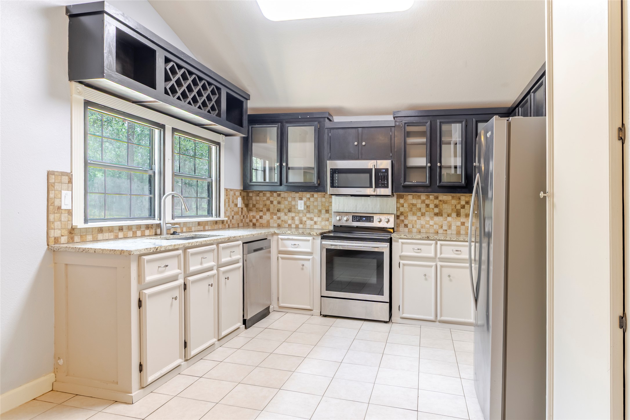 4459 Pettytown Road Dale, TX 78616 - Photo 23 of 30 a kitchen with a stove and a sink