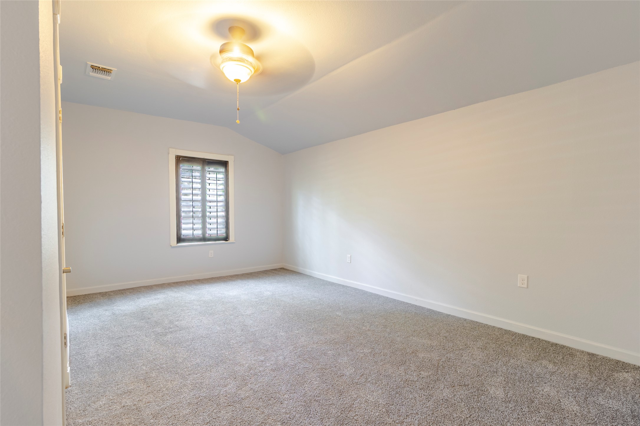 4459 Pettytown Road Dale, TX 78616 - Photo 26 of 30 a view of an empty room with a window