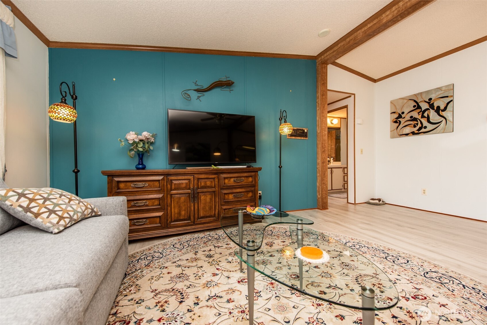 325 North 5th Avenue, Unit 48 Sequim, WA 98382 - Photo 11 of 40 a bedroom with a bed and a television