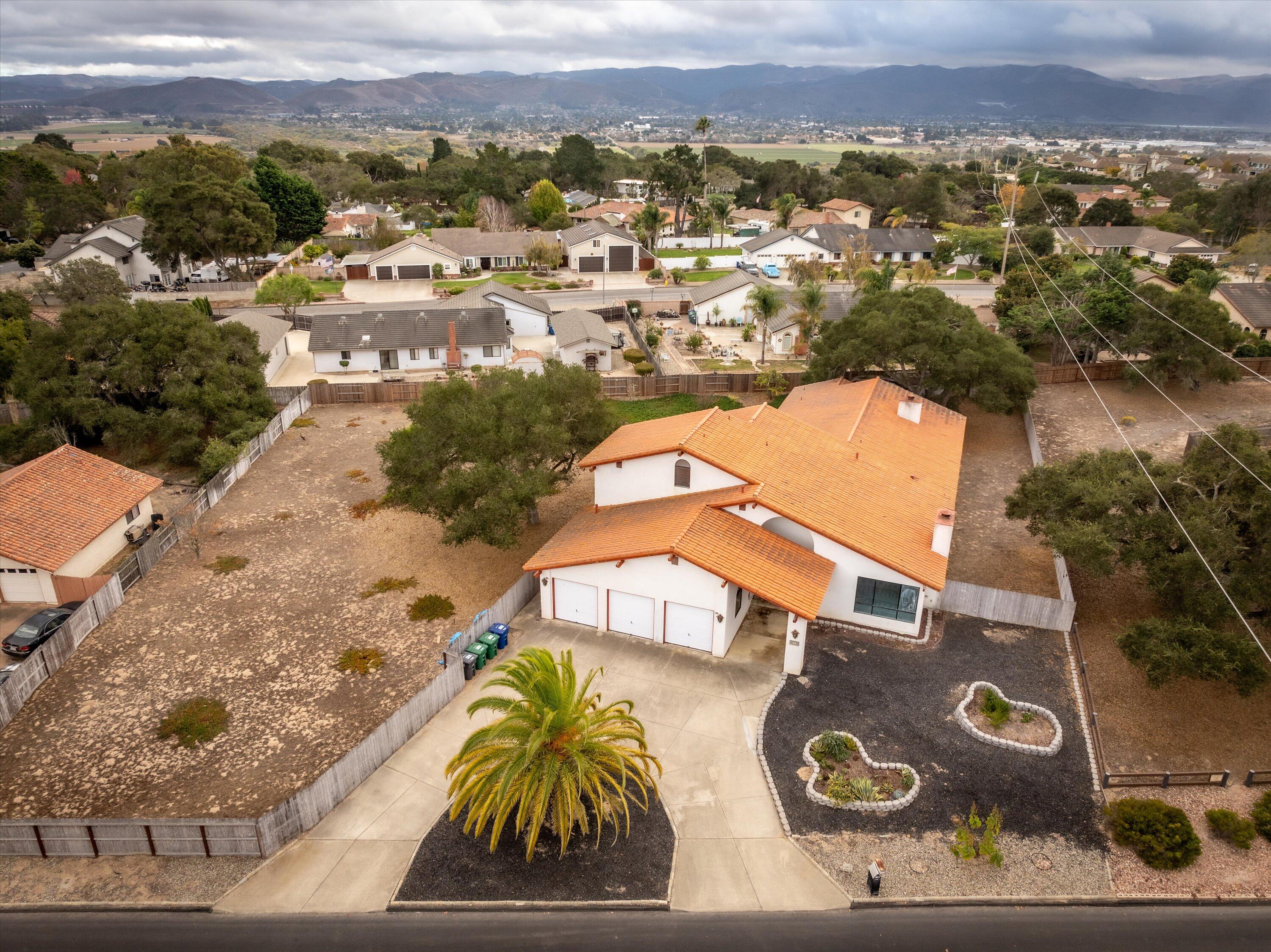 970 Onstott Road Lompoc, CA 93436 - Photo 3 of 38 an aerial view of residential houses with outdoor space