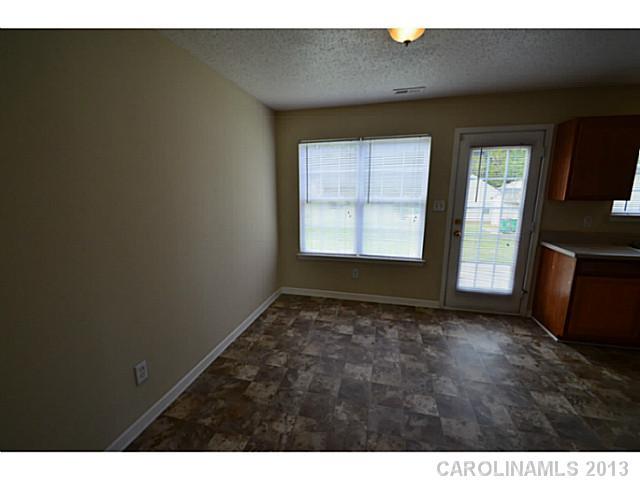 6515 Sunman Road Charlotte, NC 28216 - Photo 8 of 8 a view of an empty room and window