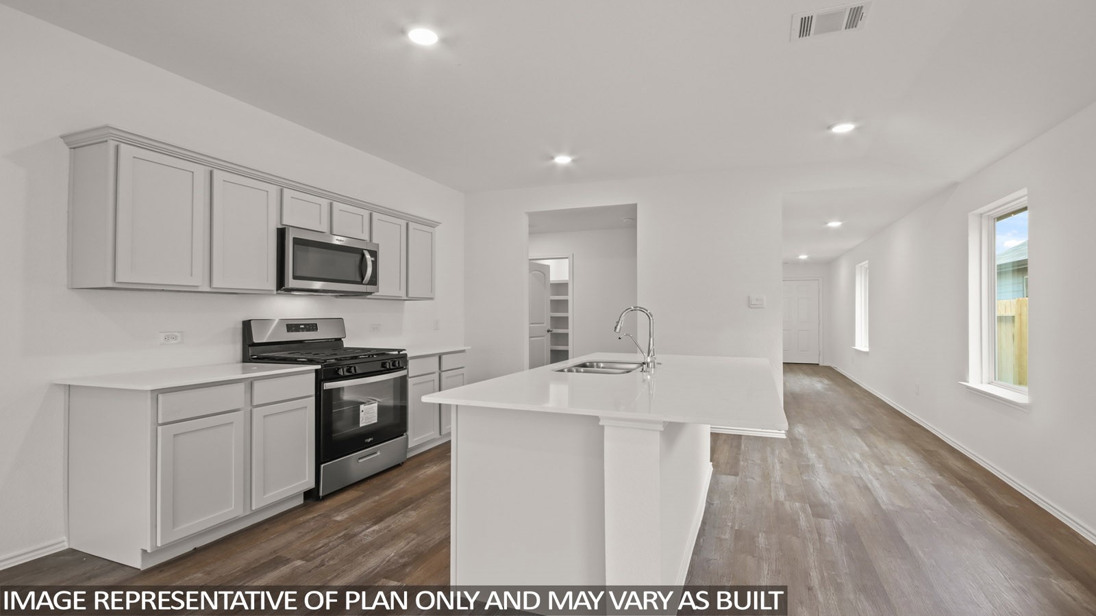 1690 Portia Lane Conroe, TX 77301 - Photo 1 of 18 a kitchen with stainless steel appliances kitchen island granite countertop a sink stove and refrigerator