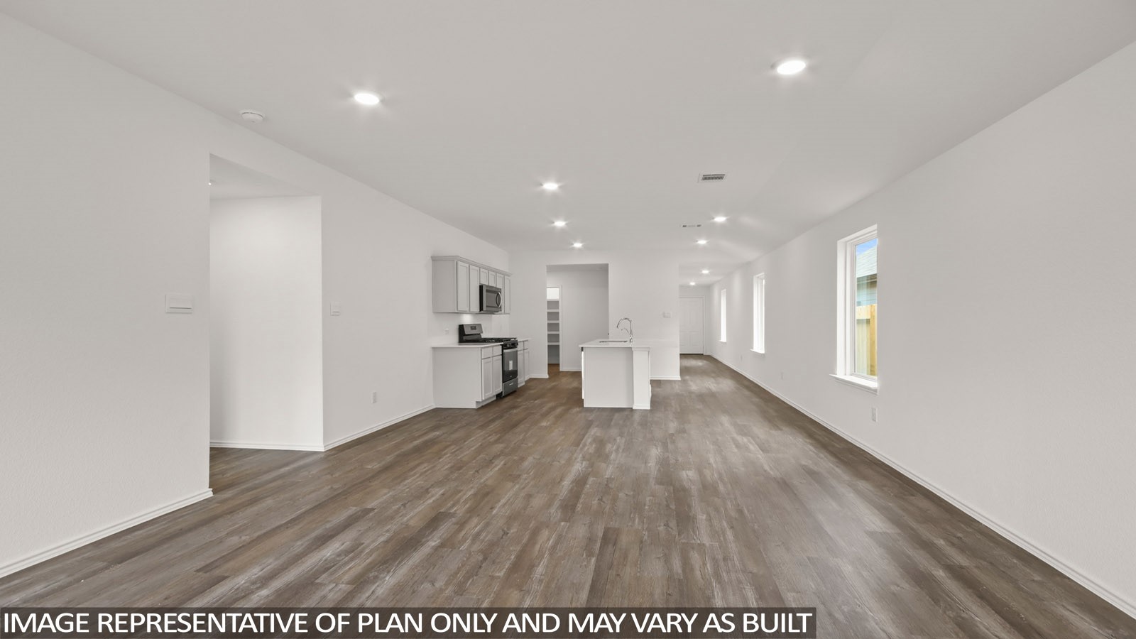 1690 Portia Lane Conroe, TX 77301 - Photo 3 of 18 a view of a kitchen with wooden floor