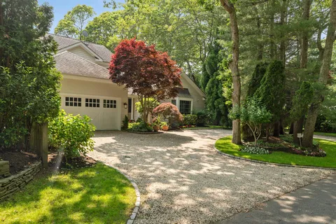a view of a street with a building in the background