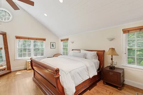 a bed room with a bed and a couch