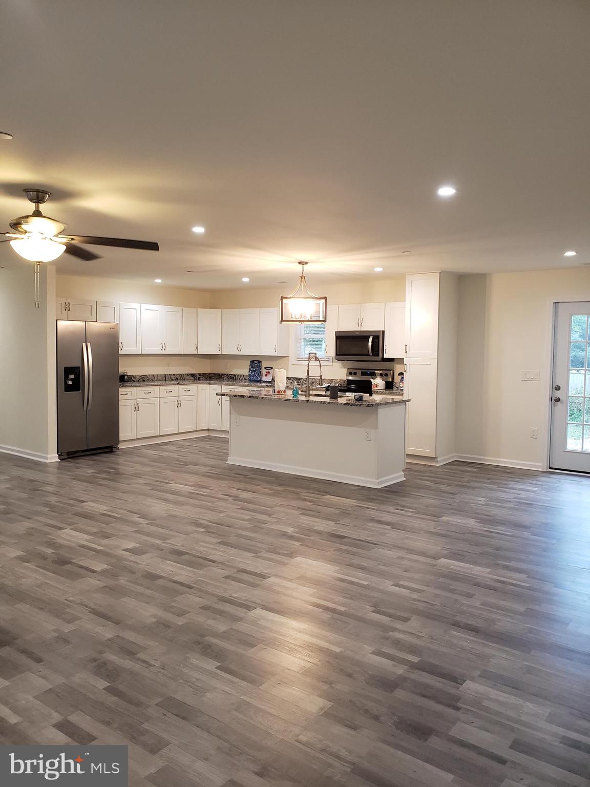104 East 3rd Street Ridgely, MD 21660 - Photo 13 of 49 Open floor plan showing kitchen from LR.