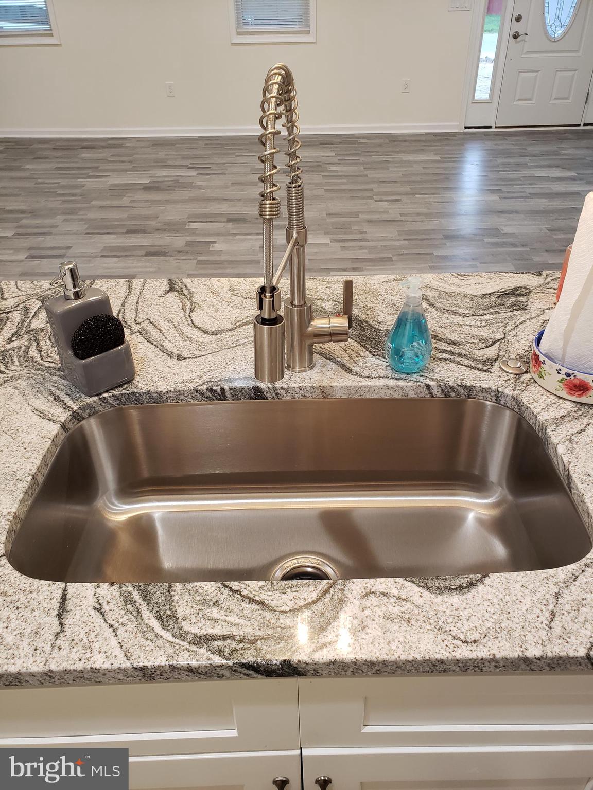 104 East 3rd Street Ridgely, MD 21660 - Photo 20 of 49 Deep stainless steel sink in island.