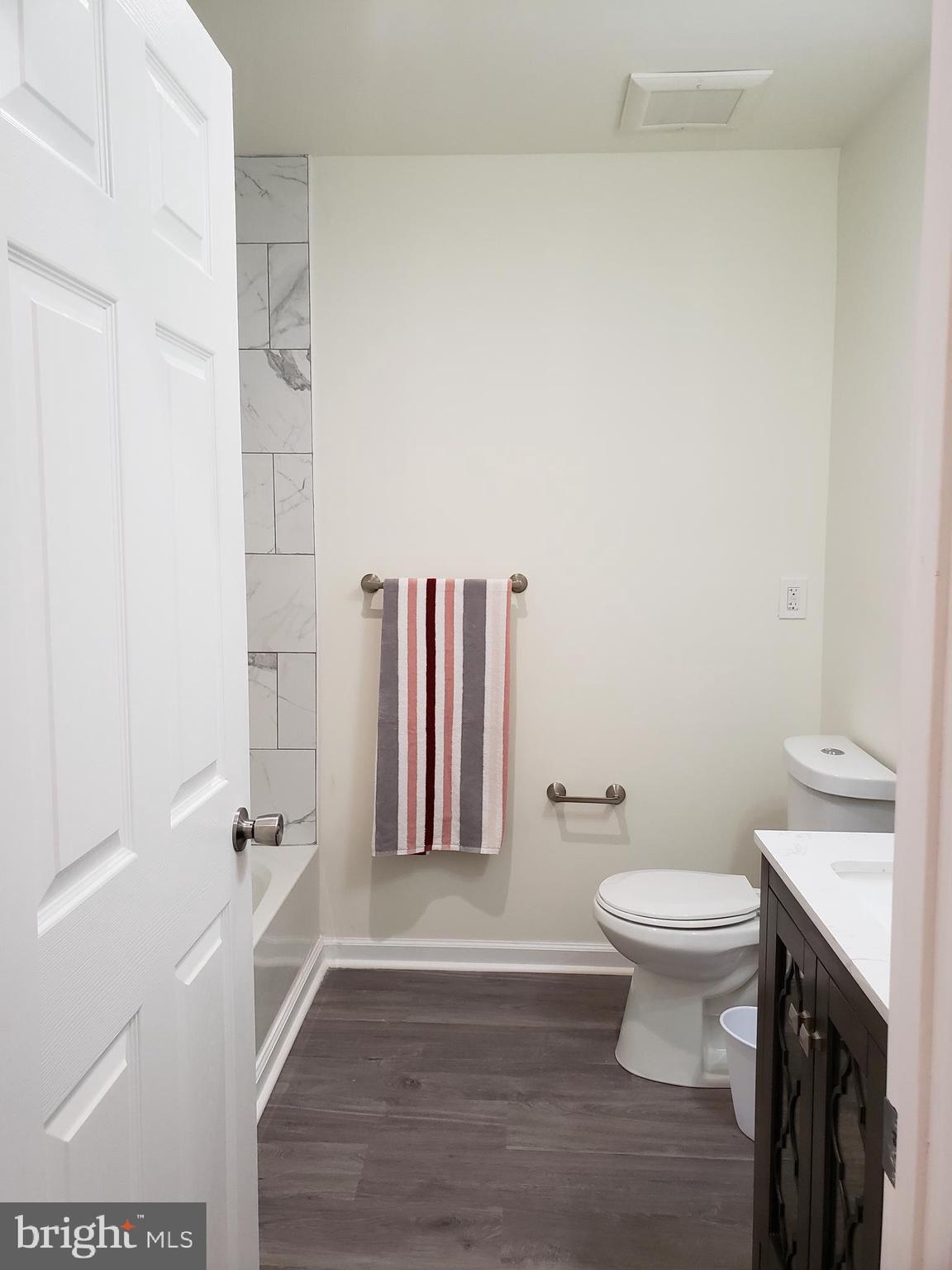 104 East 3rd Street Ridgely, MD 21660 - Photo 35 of 49 Bath between bedrooms 2 and 3 for convenience.