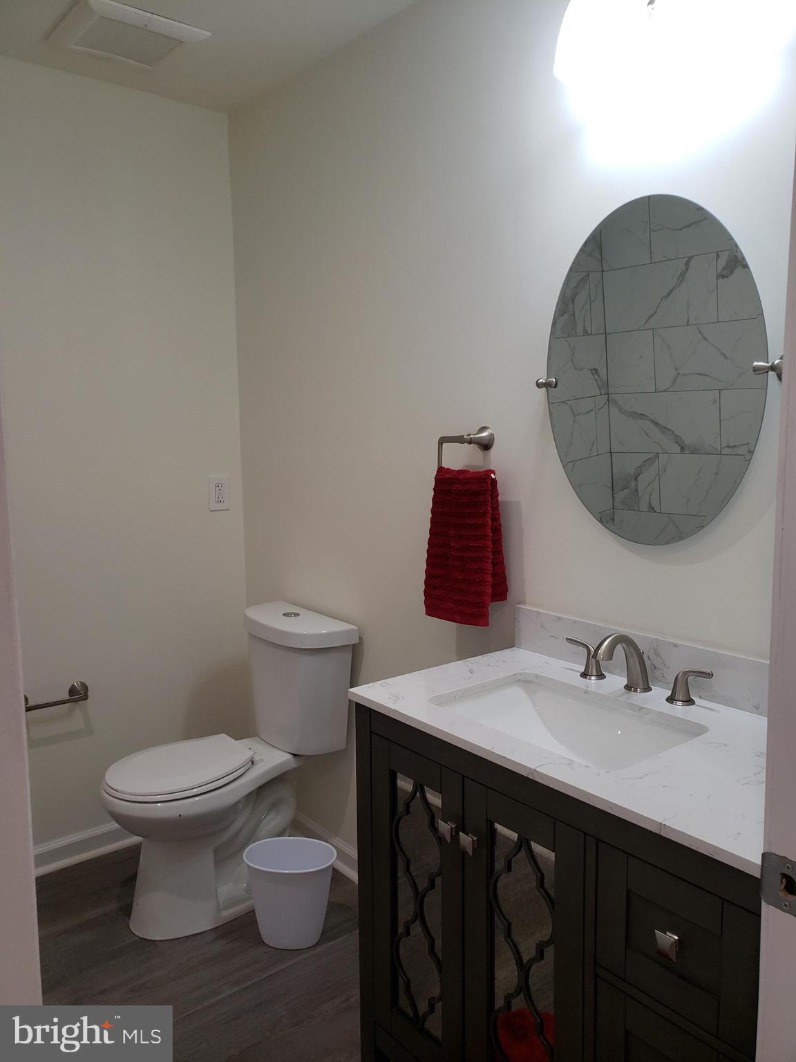 104 East 3rd Street Ridgely, MD 21660 - Photo 38 of 49 Household bath with single vanity & mirror