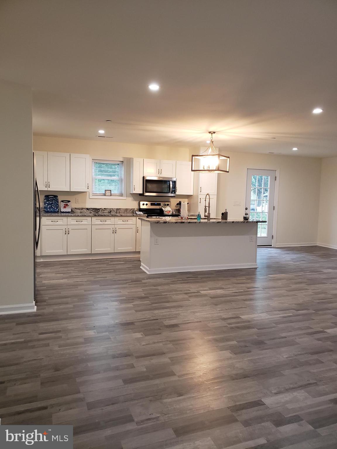104 East 3rd Street Ridgely, MD 21660 - Photo 9 of 49 View from front door to kitchen/dining area