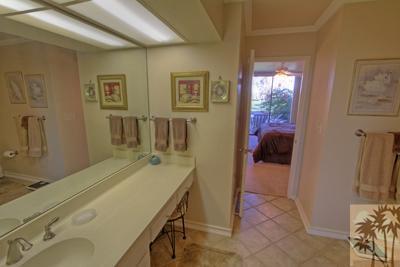 28 Calle Encinitas Rancho Mirage, CA 92270 - Photo 14 of 25 a spacious bathroom with a sink a mirror and shower