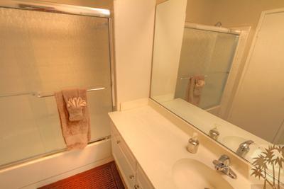 28 Calle Encinitas Rancho Mirage, CA 92270 - Photo 18 of 25 a bathroom with a tub and a shower