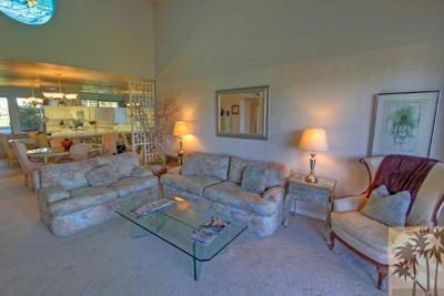 28 Calle Encinitas Rancho Mirage, CA 92270 - Photo 3 of 25 a living room with furniture and a large window