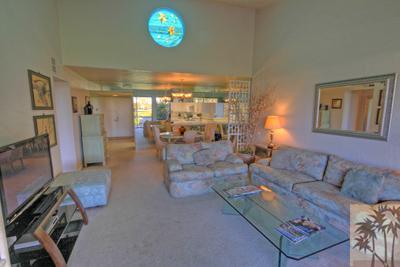28 Calle Encinitas Rancho Mirage, CA 92270 - Photo 4 of 25 a living room with furniture and a floor to ceiling window