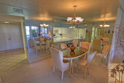 28 Calle Encinitas Rancho Mirage, CA 92270 - Photo 5 of 25 a view of a dining room with furniture and chandelier fan