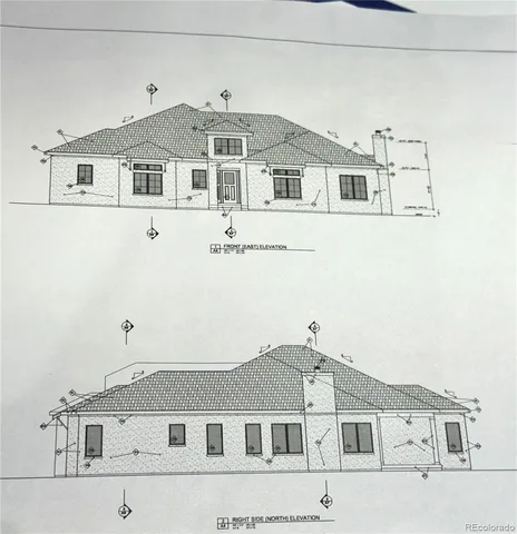 a front view of a large white building