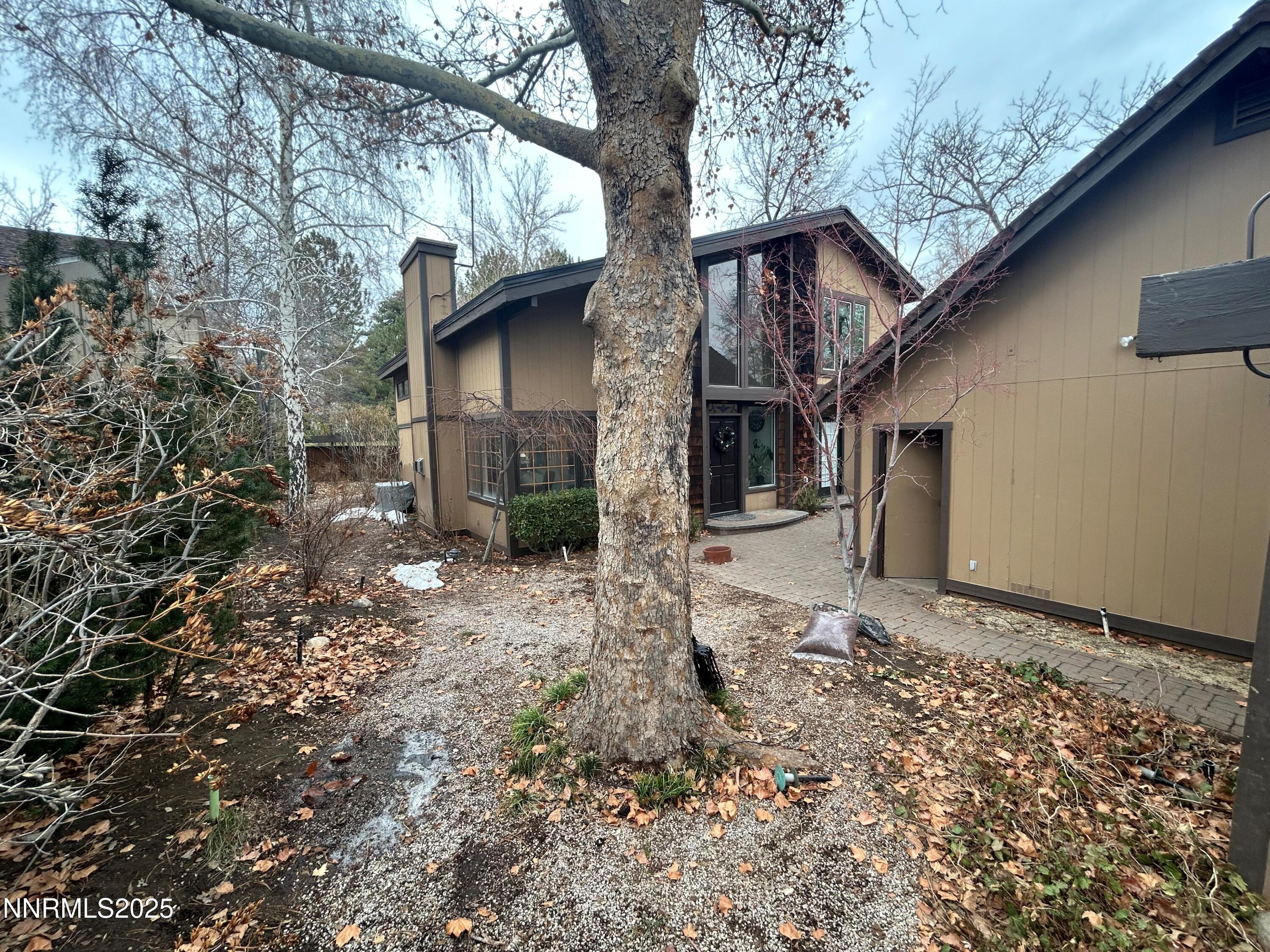 655 East Riverview Circle Reno, NV 89509 - Photo 30 of 40 Exterior Front 4 + yard