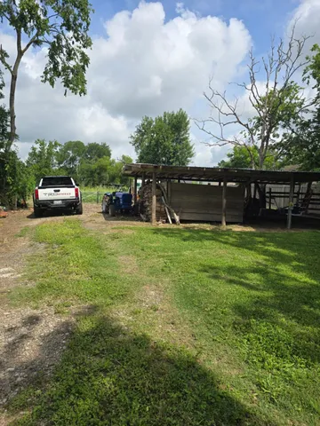 a view of a house with a park