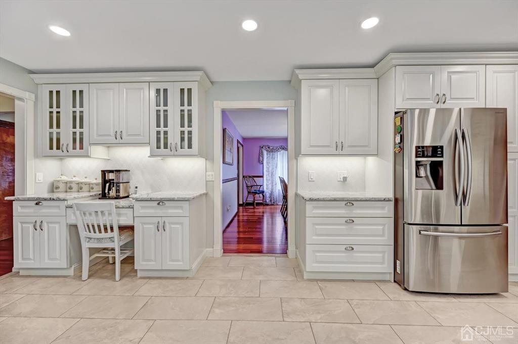 38 Pittenger Pond Road Freehold, NJ 07728 - Photo 12 of 43 a kitchen with appliances cabinets and furniture
