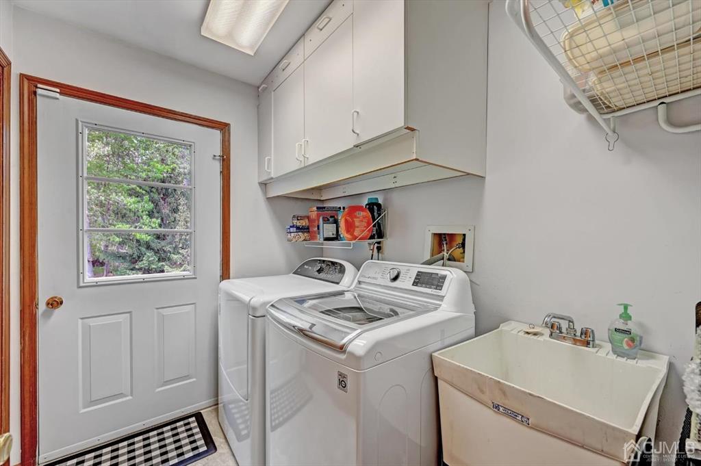 38 Pittenger Pond Road Freehold, NJ 07728 - Photo 23 of 43 a utility room with dryer and washer
