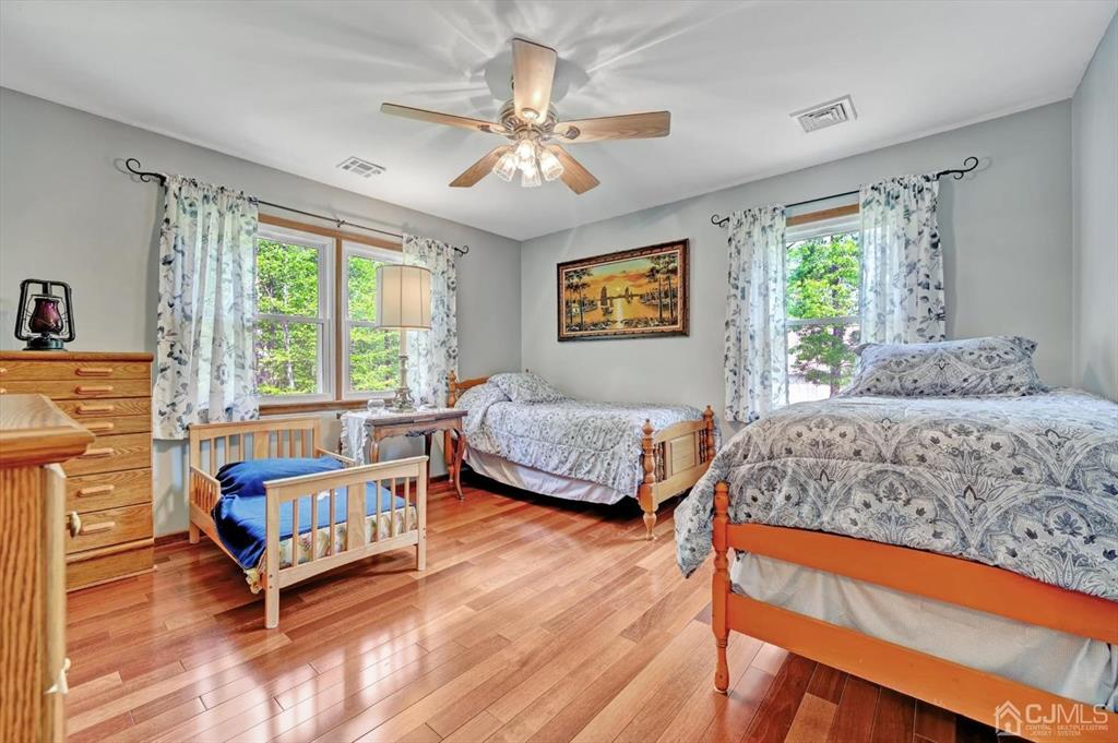 38 Pittenger Pond Road Freehold, NJ 07728 - Photo 29 of 43 a bedroom with a bed and a window