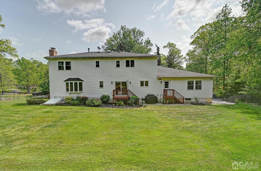 38 Pittenger Pond Road Freehold, NJ 07728 - Photo 34 of 43 a view of a house with a yard
