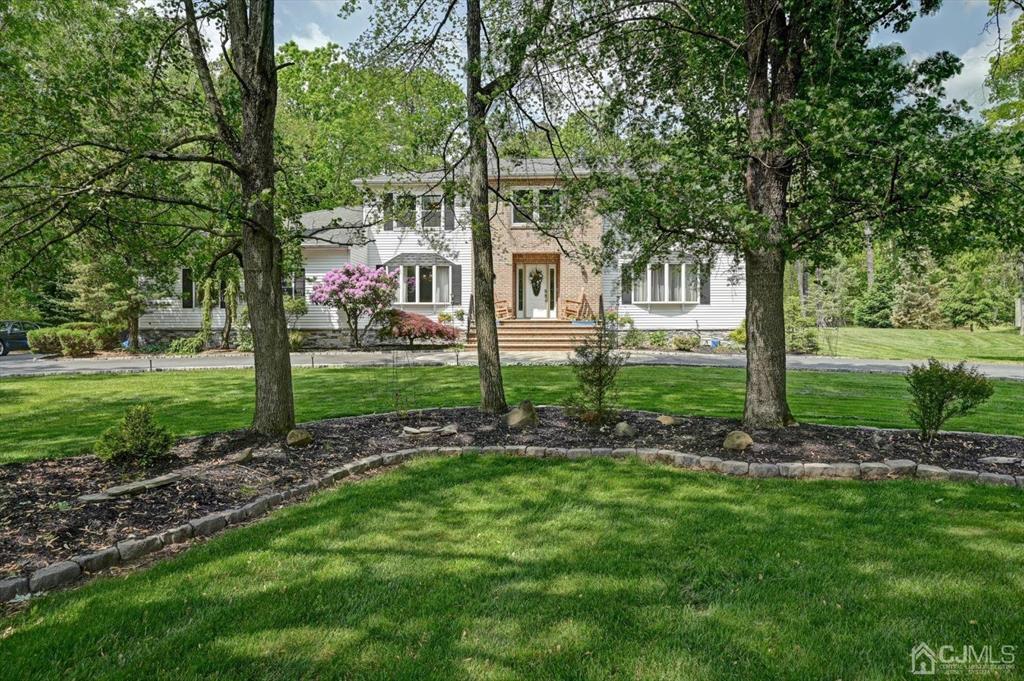 38 Pittenger Pond Road Freehold, NJ 07728 - Photo 39 of 43 a front view of a house with a yard