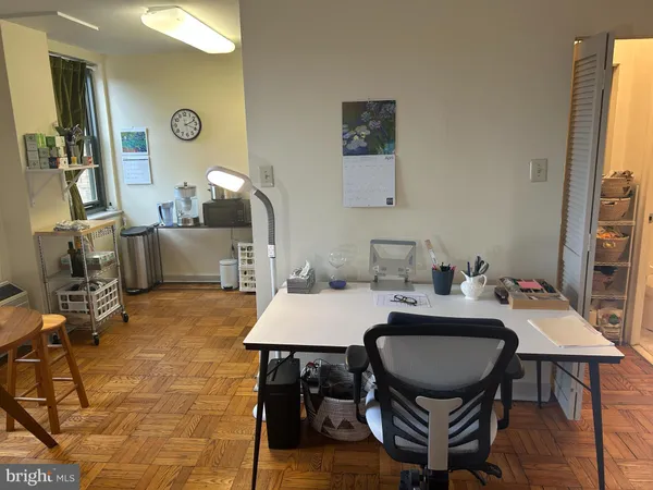a view of a dining room with furniture