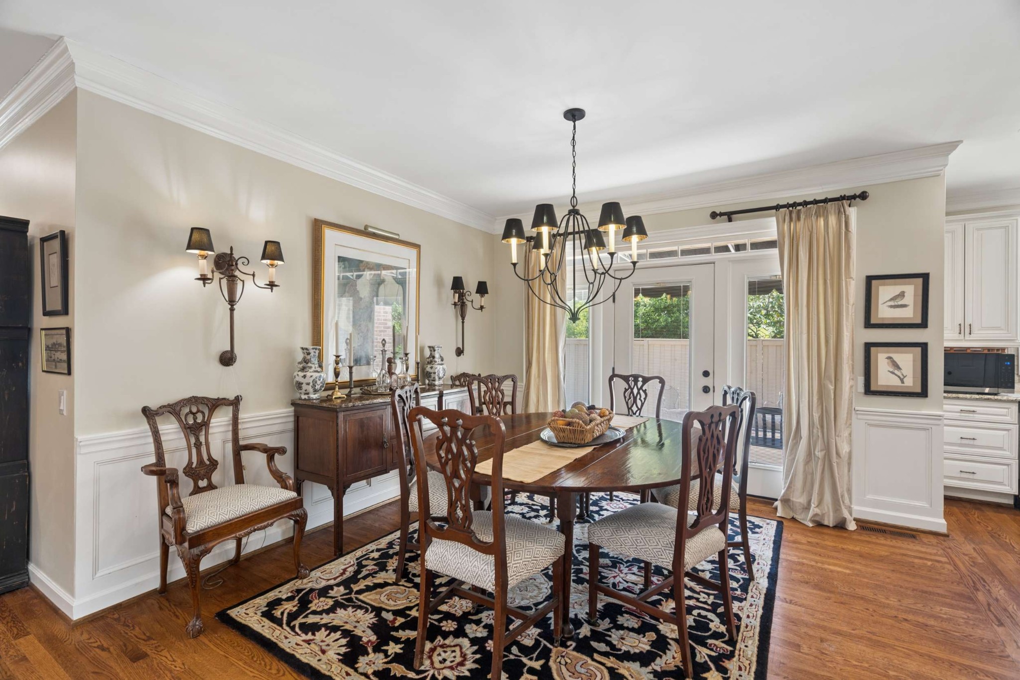 2723 Abbott Martin Road Nashville, TN 37215 - Photo 13 of 45 a view of a livingroom and dining room with furniture wooden floor a chandelier