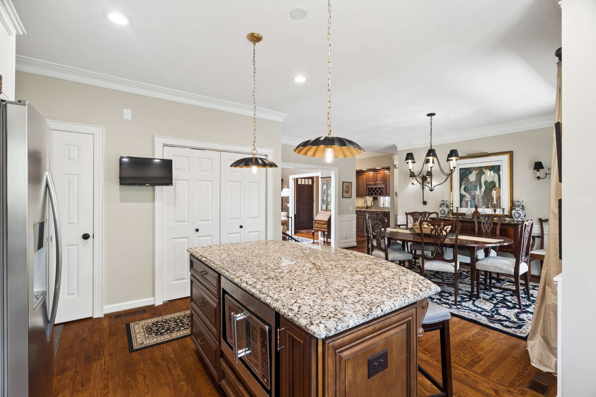 2723 Abbott Martin Road Nashville, TN 37215 - Photo 17 of 45 a kitchen with stainless steel appliances granite countertop a kitchen island a stove and a cabinets