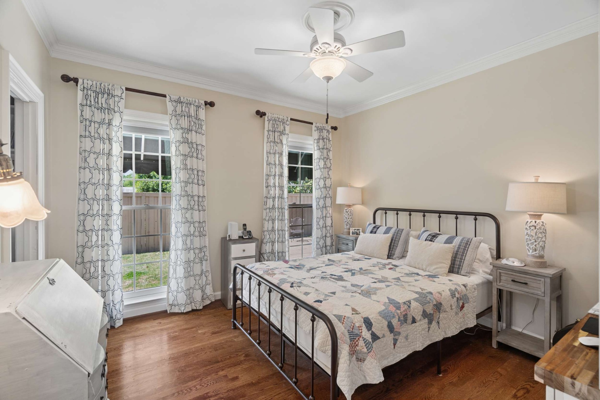 2723 Abbott Martin Road Nashville, TN 37215 - Photo 22 of 45 a bedroom with a large bed and a chandelier