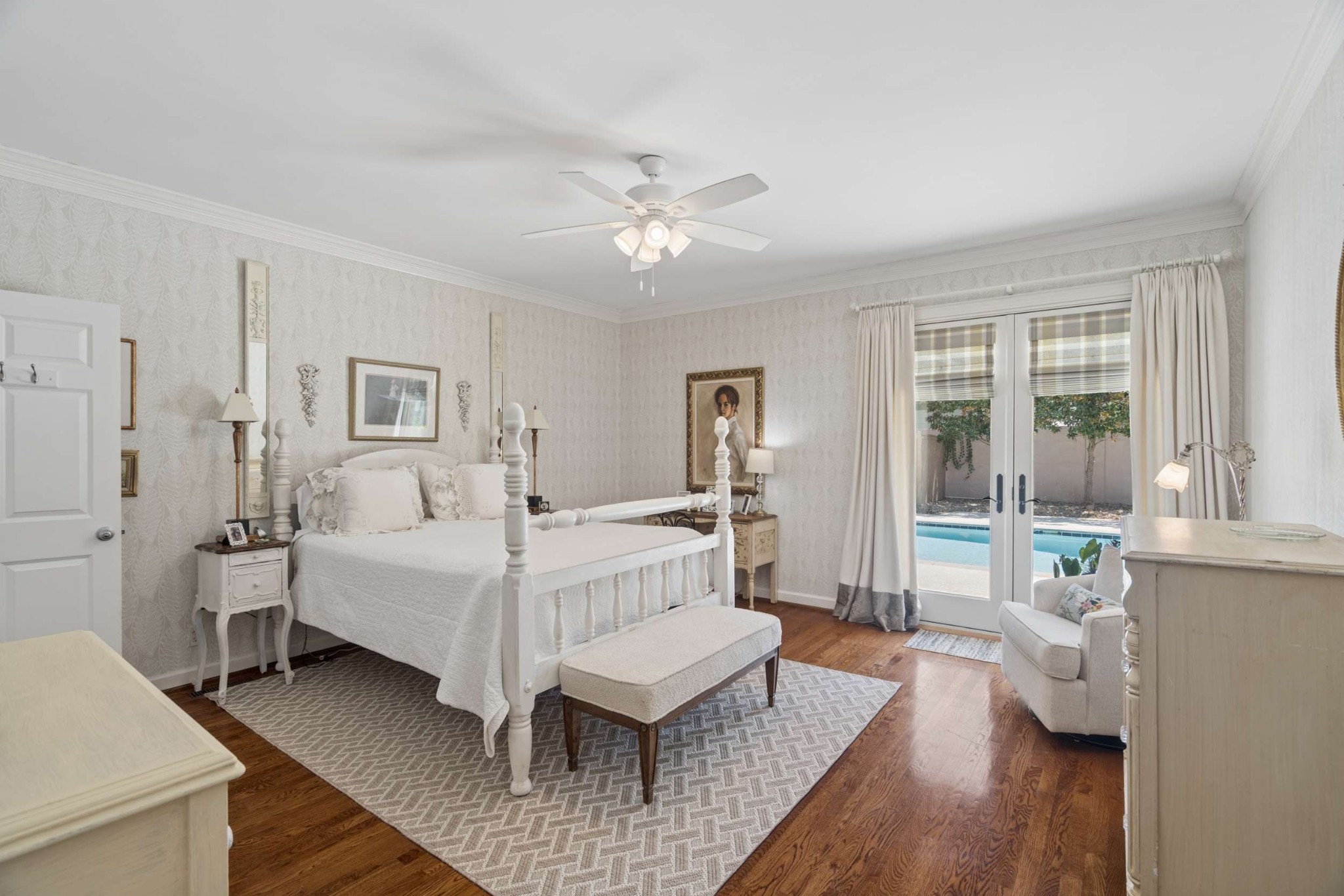2723 Abbott Martin Road Nashville, TN 37215 - Photo 29 of 45 a spacious bedroom with a bed and a chandelier