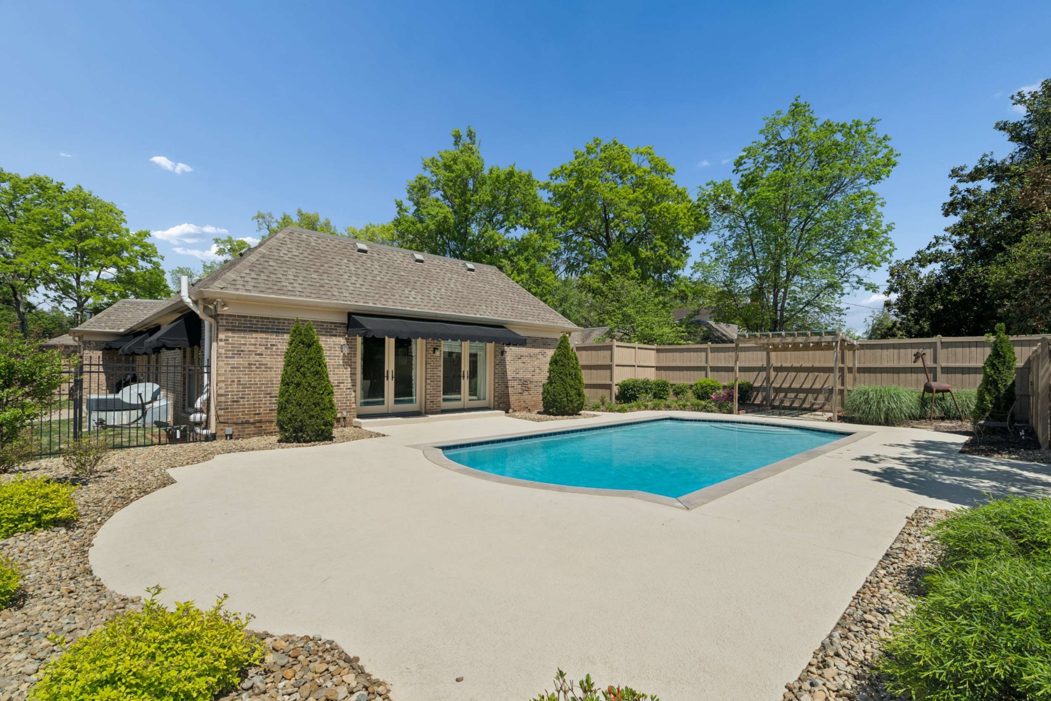 2723 Abbott Martin Road Nashville, TN 37215 - Photo 38 of 45 a front view of a house with yard and green space