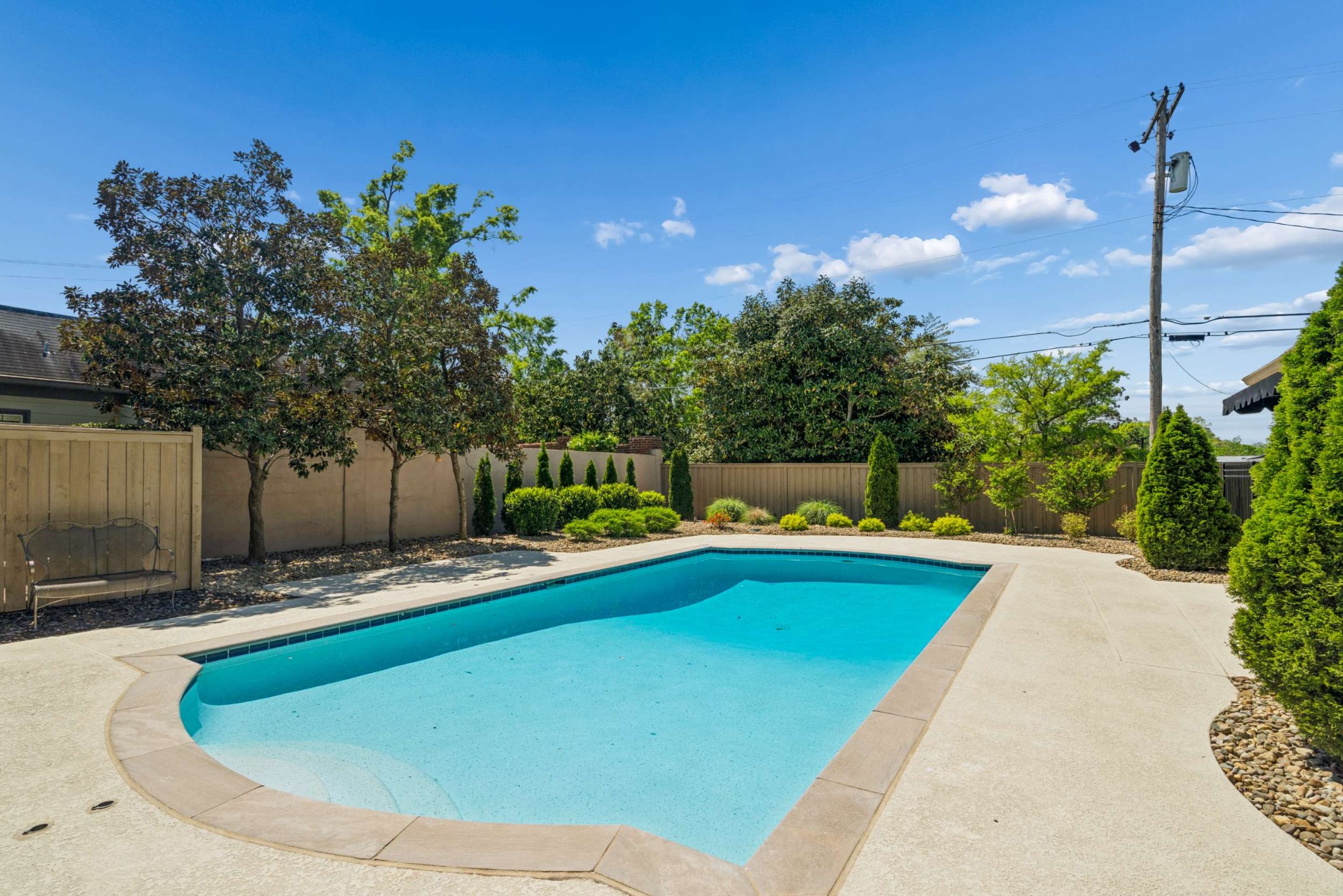 2723 Abbott Martin Road Nashville, TN 37215 - Photo 40 of 45 a view of a swimming pool with a yard